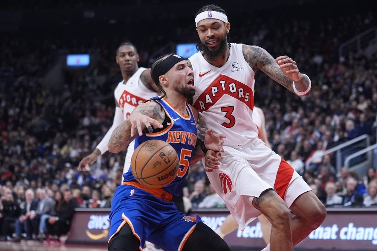 Mar 3, 2026; Toronto, Ontario, CAN; Toronto Raptors forward Brandon Ingram (3) defends against New York Knicks guard Jose Alvarado (5) during the first half at Scotiabank Arena. Mandatory Credit: John E. Sokolowski-Imagn Images