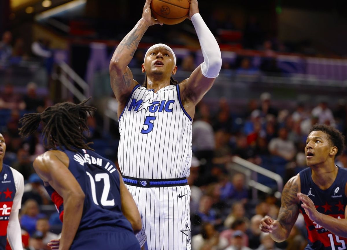 Mar 3, 2026; Orlando, Florida, USA;  Orlando Magic forward Paolo Banchero (5) takes a shot in the second half against the Washington Wizards at Kia Center. Mandatory Credit: Russell Lansford-Imagn Images