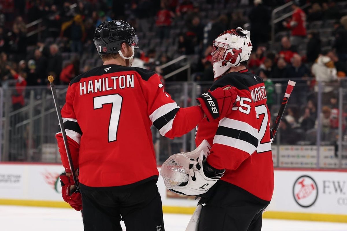 Mar 3, 2026; Newark, New Jersey, USA; New Jersey Devils goaltender Jacob Markstrom (25) and defenseman Dougie Hamilton (7) celebrate a Devils win over the Florida Panthers at Prudential Center. Mandatory Credit: Ed Mulholland-Imagn Images