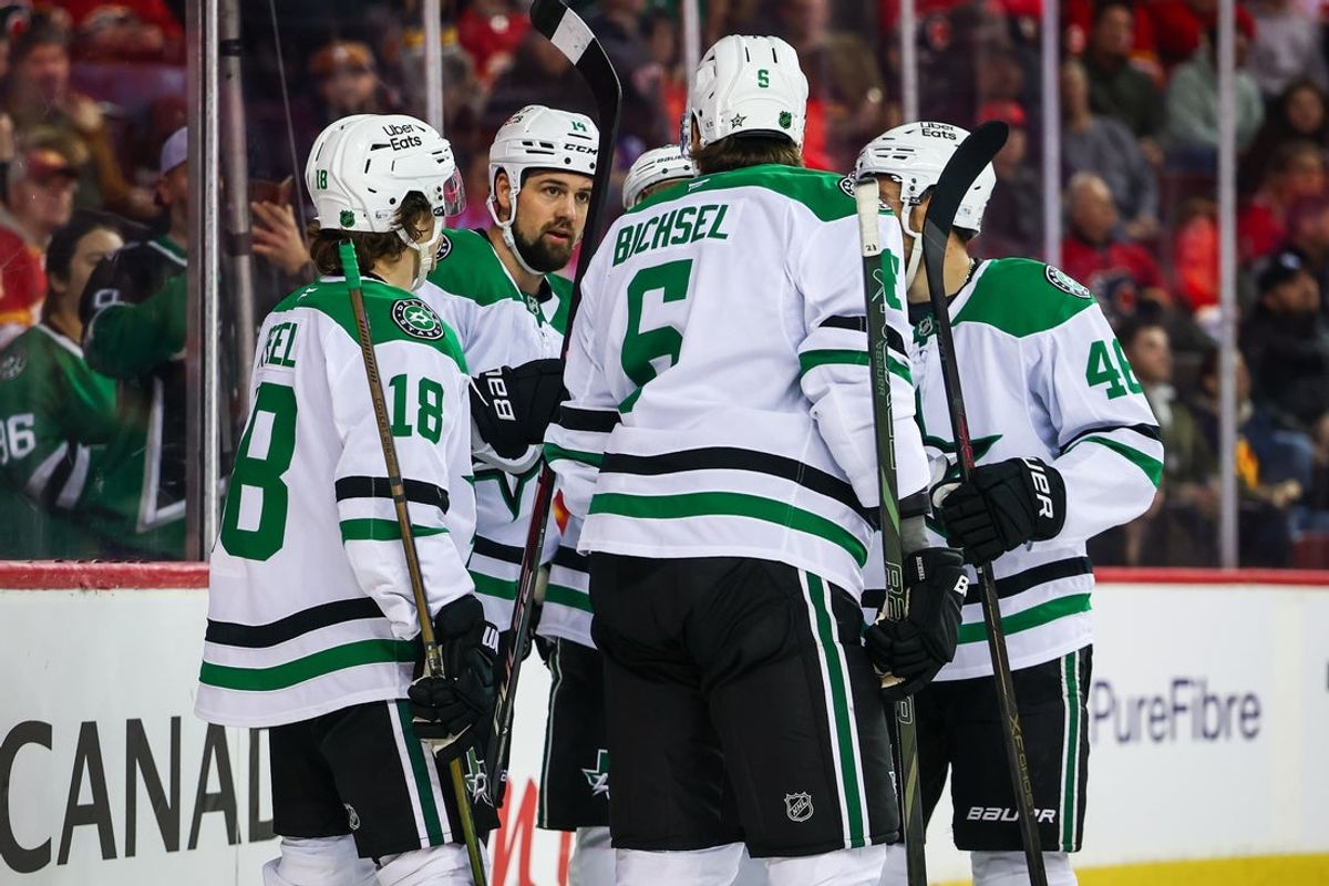 Mar 3, 2026; Calgary, Alberta, CAN; Dallas Stars left wing Jamie Benn (14) celebrates his goal with teammates against the Calgary Flames during the first period at Scotiabank Saddledome. Mandatory Credit: Sergei Belski-Imagn Images