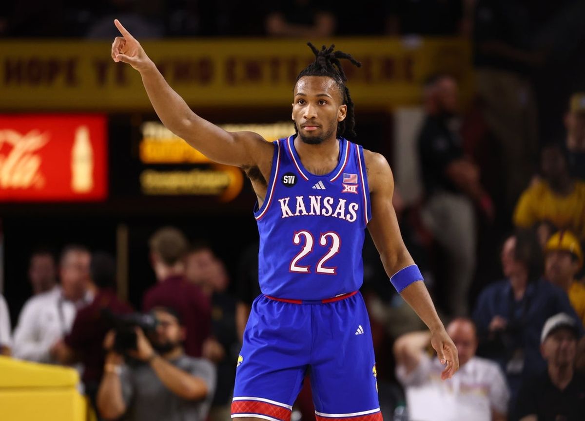 Mar 3, 2026; Tempe, Arizona, USA; Kansas Jayhawks guard Darryn Peterson (22) reacts against the Arizona State Sun Devils in the first half at Desert Financial Arena. Mandatory Credit: Mark J. Rebilas-Imagn Images