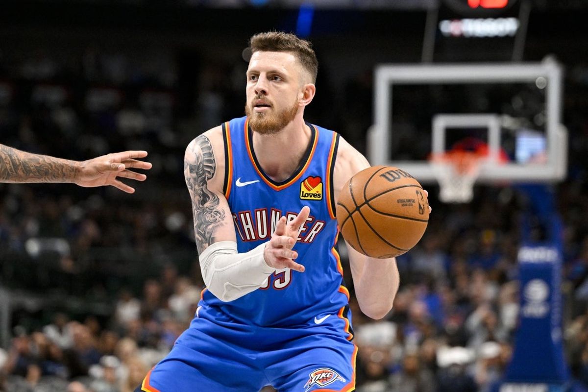 Mar 1, 2026; Dallas, Texas, USA; Oklahoma City Thunder center Isaiah Hartenstein (55) controls the ball during the game between the Mavericks and the Thunder at American Airlines Center. Mandatory Credit: Jerome Miron-Imagn Images