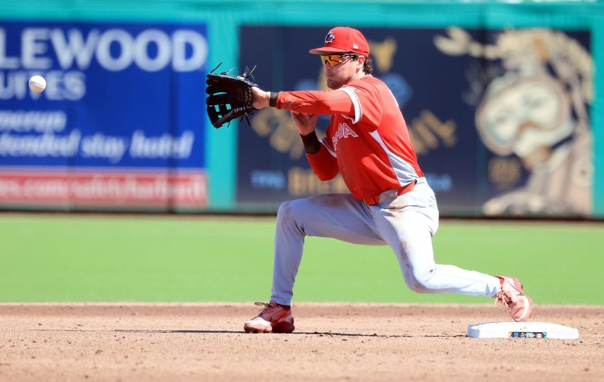 Mar 4, 2026; Clearwater, FL, USA; Canada second baseman Tyler Black (7) catches the ball its second to force an out during the second inning against the Philadelphia Phillies at BayCare Ballpark. Mandatory Credit: Kim Klement Neitzel-Imagn Images