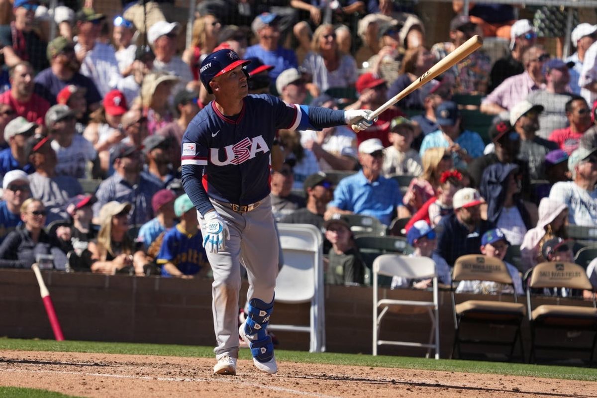 Mar 4, 2026; Scottsdale, AZ, USA; United States third baseman Alex Bregman (2) hits a solo home run against the Colorado Rockies in the fifth inning at Salt River Fields. Mandatory Credit: Rick Scuteri-Imagn Images