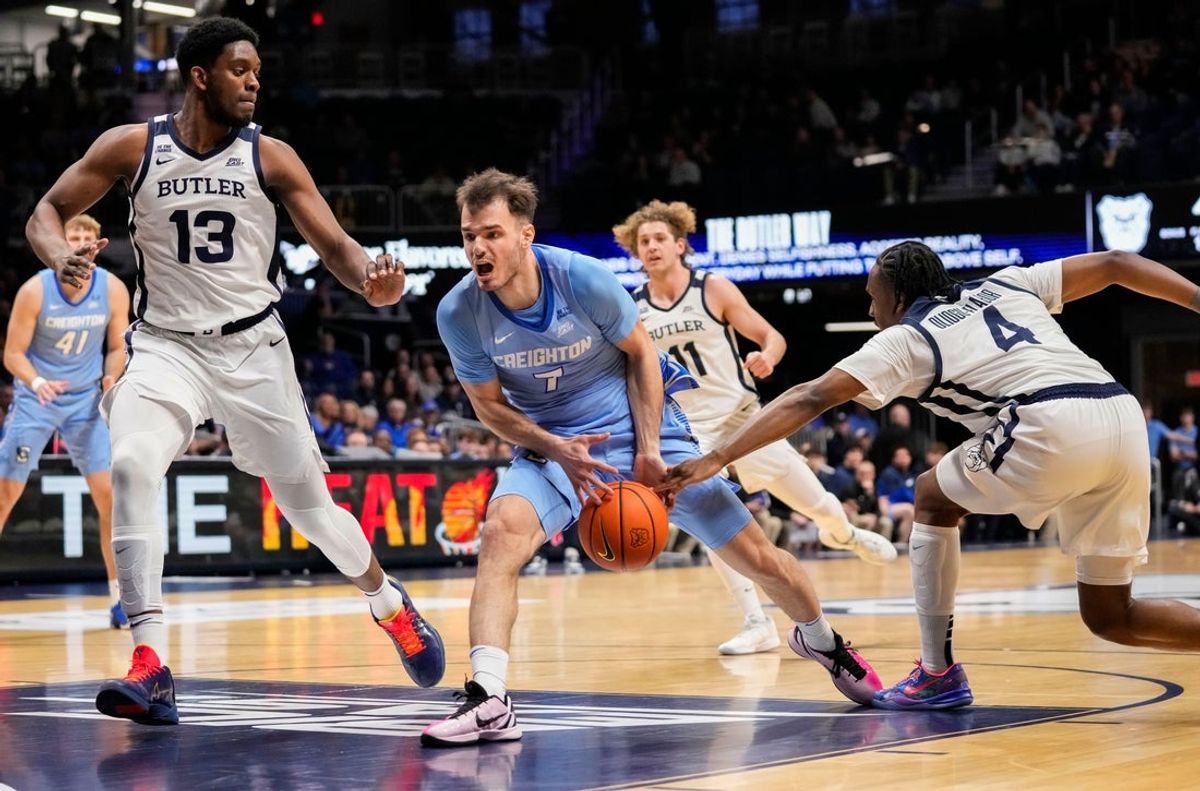 Butler Bulldogs forward Efeosa Oliogu-Elabor (4) tips the ball away from Creighton Bluejays guard Fedor Zugic (7) on Wednesday, March 4, 2026, during the game at Hinkle Fieldhouse in Indianapolis.