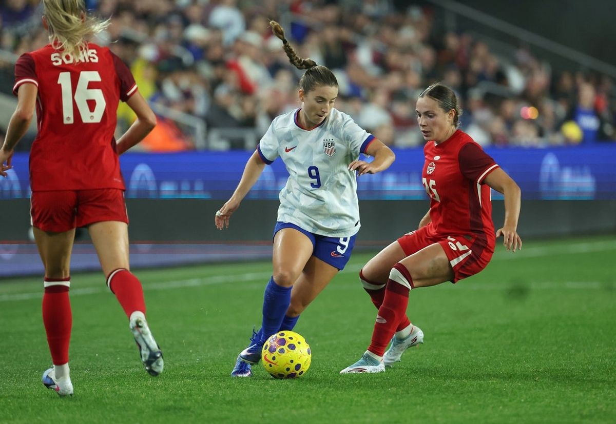 Mar 4, 2026; Columbus, Ohio, USA; United States forward Ally Sentnor (9) controls the ball as Canada forward Janine Sonis (16) defends during the first half at Scotts Miracle-Gro Field. Mandatory Credit: Joseph Maiorana-Imagn Images