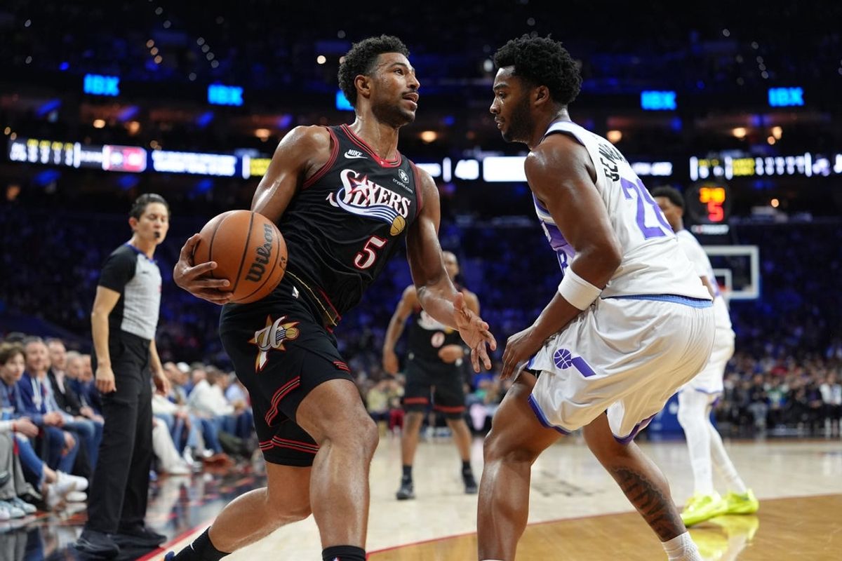 Mar 4, 2026; Philadelphia, Pennsylvania, USA; Philadelphia 76ers guard Quentin Grimes (5) drives against Utah Jazz forward Brice Sensabaugh (28) in the second quarter at Xfinity Mobile Arena. Mandatory Credit: Kyle Ross-Imagn Images