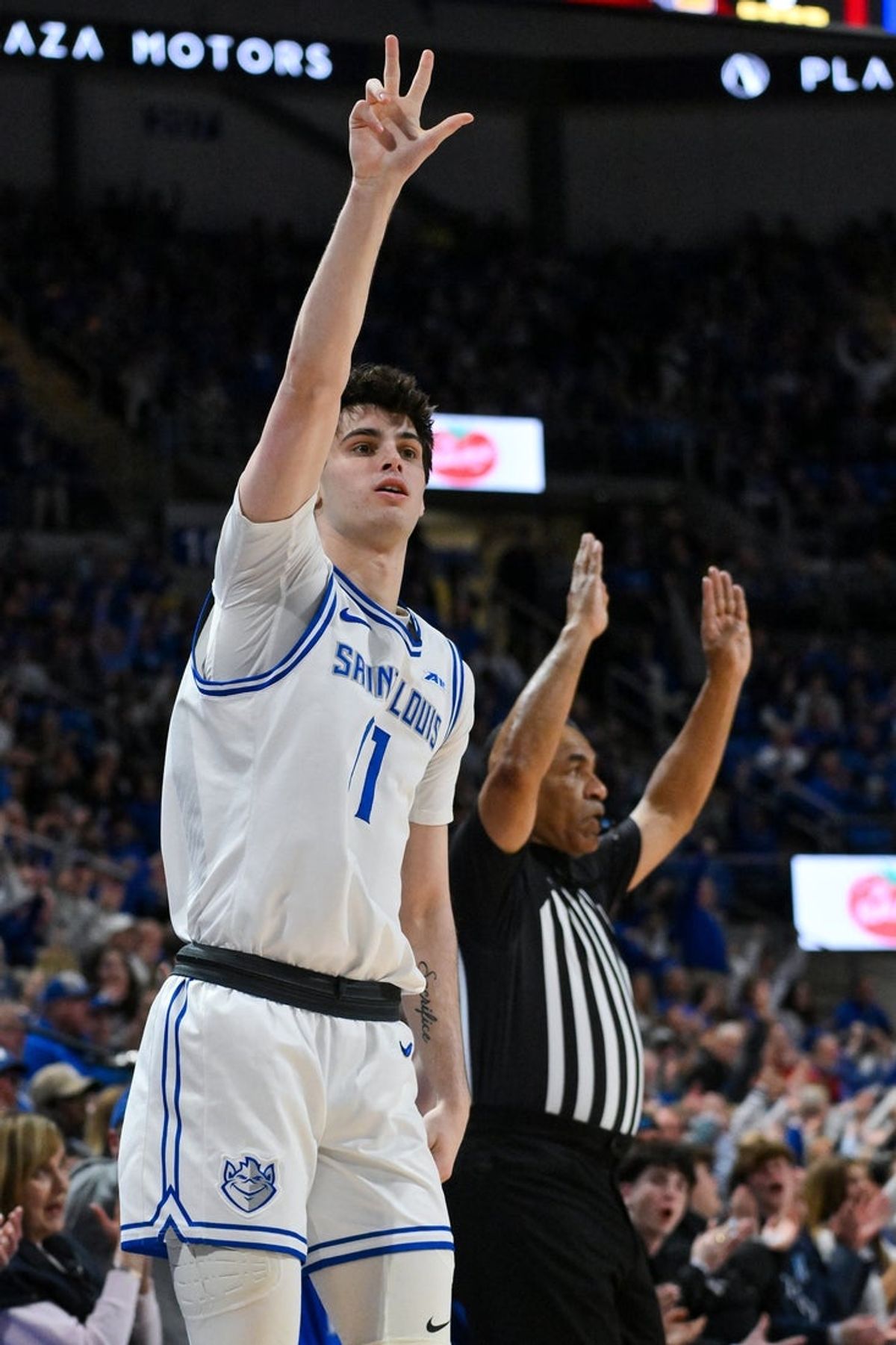 Mar 4, 2026; St. Louis, Missouri, USA; Saint Louis Billikens forward Brady Dunlap (11) reacts after making a three point shot against the Loyola Chicago Ramblers during the first half at Chaifetz Arena. Mandatory Credit: Jeff Curry-Imagn Images