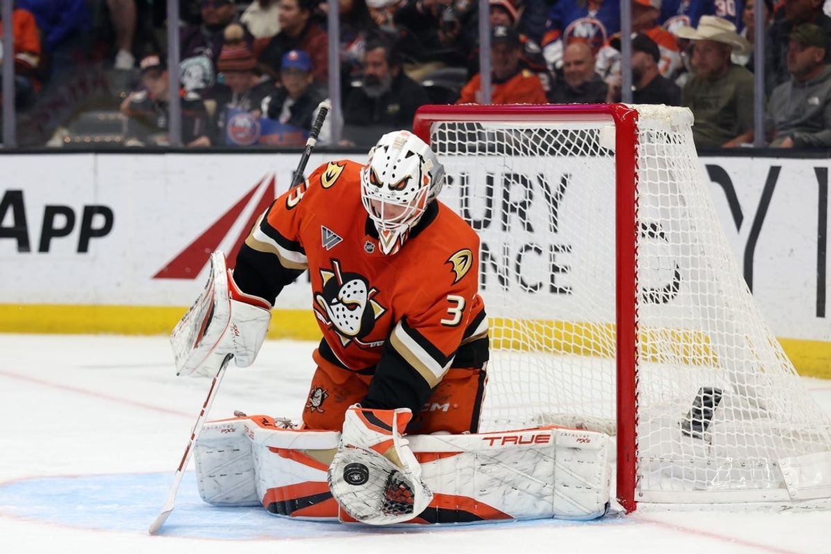 Mar 4, 2026; Anaheim, California, USA;  Anaheim Ducks goaltender Ville Husso (33) makes a save during the first period against the New York Islanders at Honda Center. Mandatory Credit: Kiyoshi Mio-Imagn Images