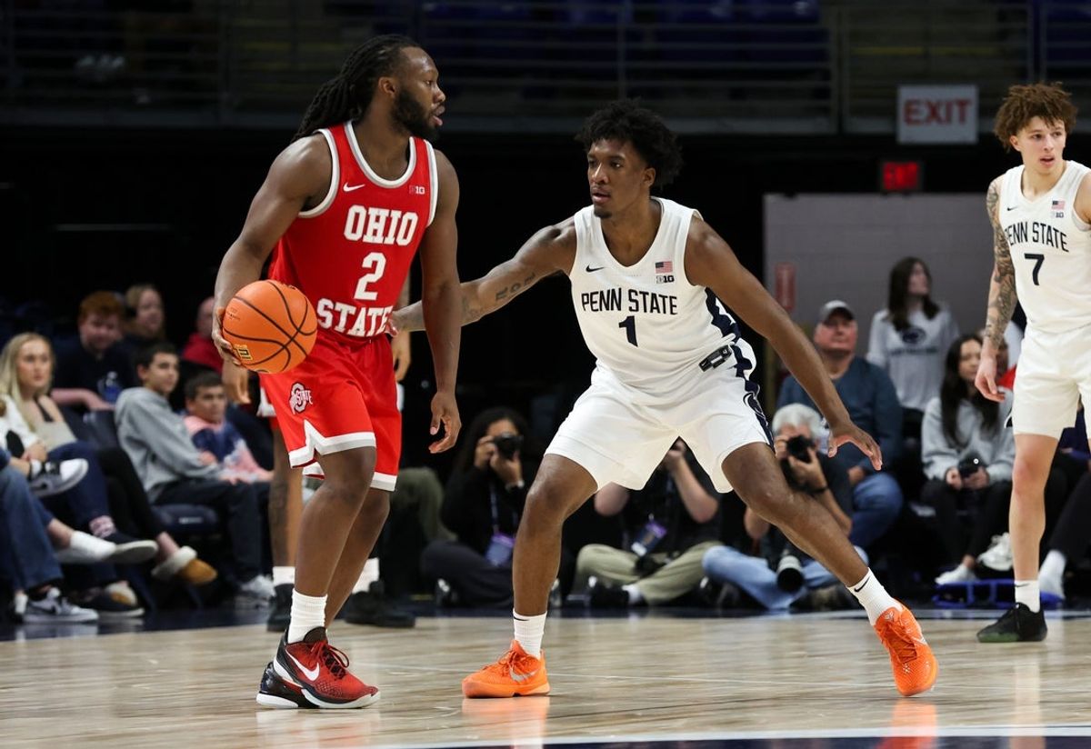 Mar 4, 2026; University Park, Pennsylvania, USA; Ohio State Buckeyes guard Bruce Thornton (2) looks to pass the ball as Penn State Nittany Lions forward Mason Blackwood (1) defends during the second half at Bryce Jordan Center. Mandatory Credit: Matthew O'Haren-Imagn Images