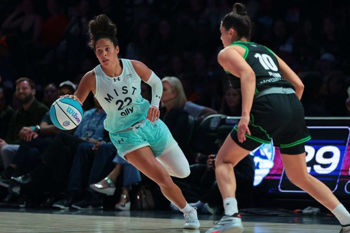 Mar 4, 2026; Miami, FL, USA; Mist guard Veronica Burton (22) drives to the basket against Phantom guard Kelsey Plum (10) during the first half of the Unrivaled championship game at Sephora Arena. Mandatory Credit: Sam Navarro-Imagn Images
