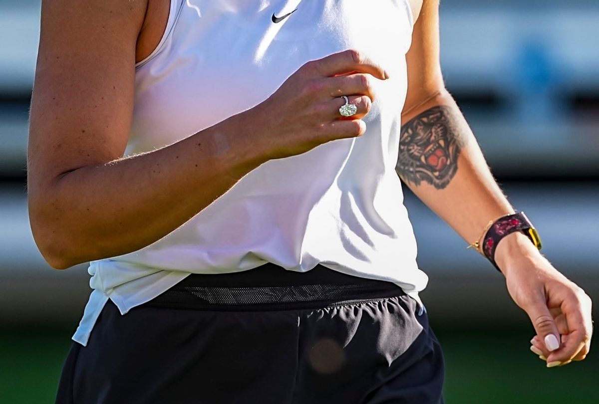 Aryna Sabalenka’s engagement ring is seen as she plays soccer on the lawn during the BNP Paribas Open in Indian Wells, Calif., Wednesday, March 4, 2026. Sabalenka and her fiancé, Georgios Frangulis, were engaged the night before.