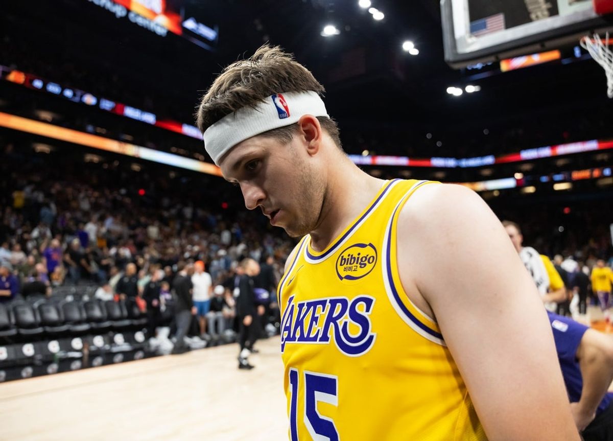 Feb 26, 2026; Phoenix, Arizona, USA; Los Angeles Lakers guard Austin Reaves (15) reacts against the Phoenix Suns at Mortgage Matchup Center. Mandatory Credit: Mark J. Rebilas-Imagn Images