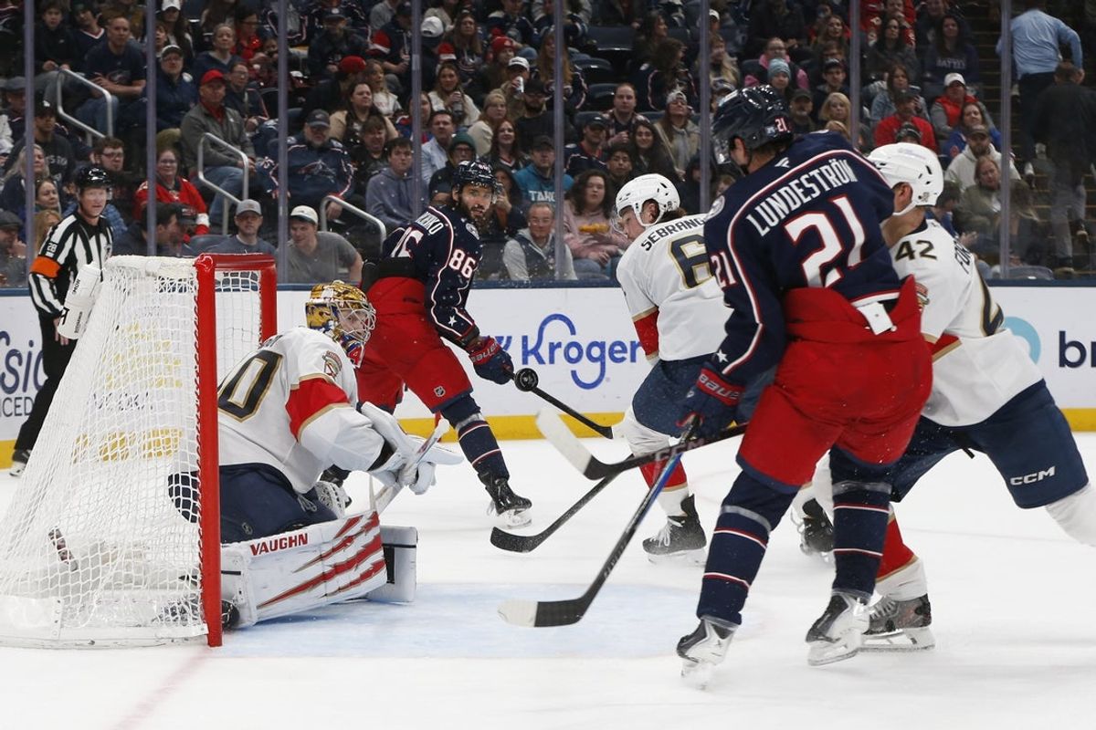Mar 5, 2026; Columbus, Ohio, USA; Columbus Blue Jackets center Isac Lundestrom (21) looks for a rebound off  the save of Florida Panthers goalie Daniil Tarasov (40) during the second period at Nationwide Arena. Mandatory Credit: Russell LaBounty-Imagn Images