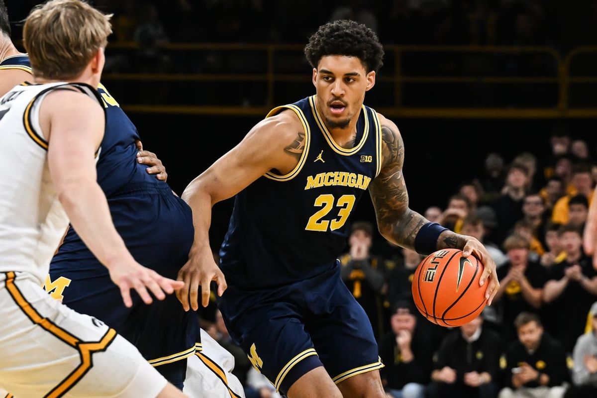 Mar 5, 2026; Iowa City, Iowa, USA; Michigan Wolverines forward Yaxel Lendeborg (23) controls the ball against the Iowa Hawkeyes during the first half at Carver-Hawkeye Arena. Mandatory Credit: Jeffrey Becker-Imagn Images