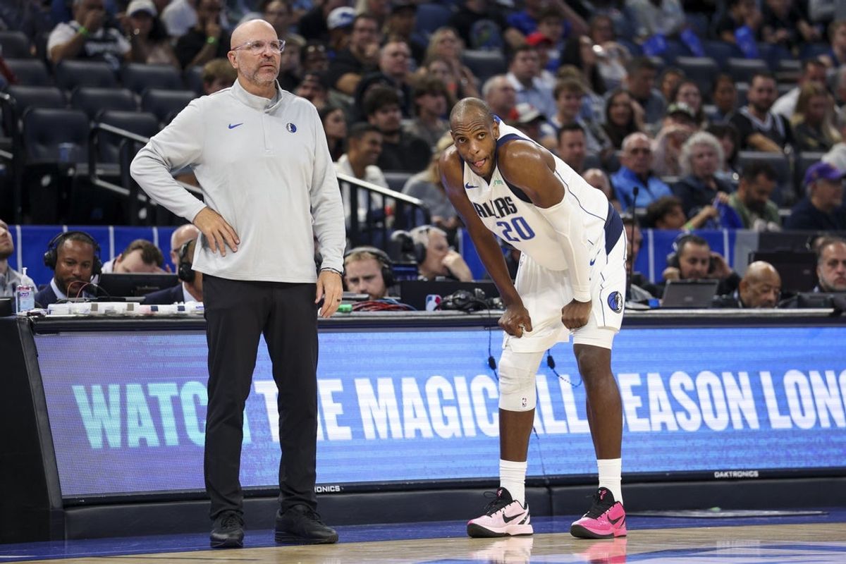 Mar 5, 2026; Orlando, Florida, USA; Dallas Mavericks head coach Jason Kidd and forward Khris Middleton (20) look on against the Orlando Magic in the third quarter at Kia Center. Mandatory Credit: Nathan Ray Seebeck-Imagn Images