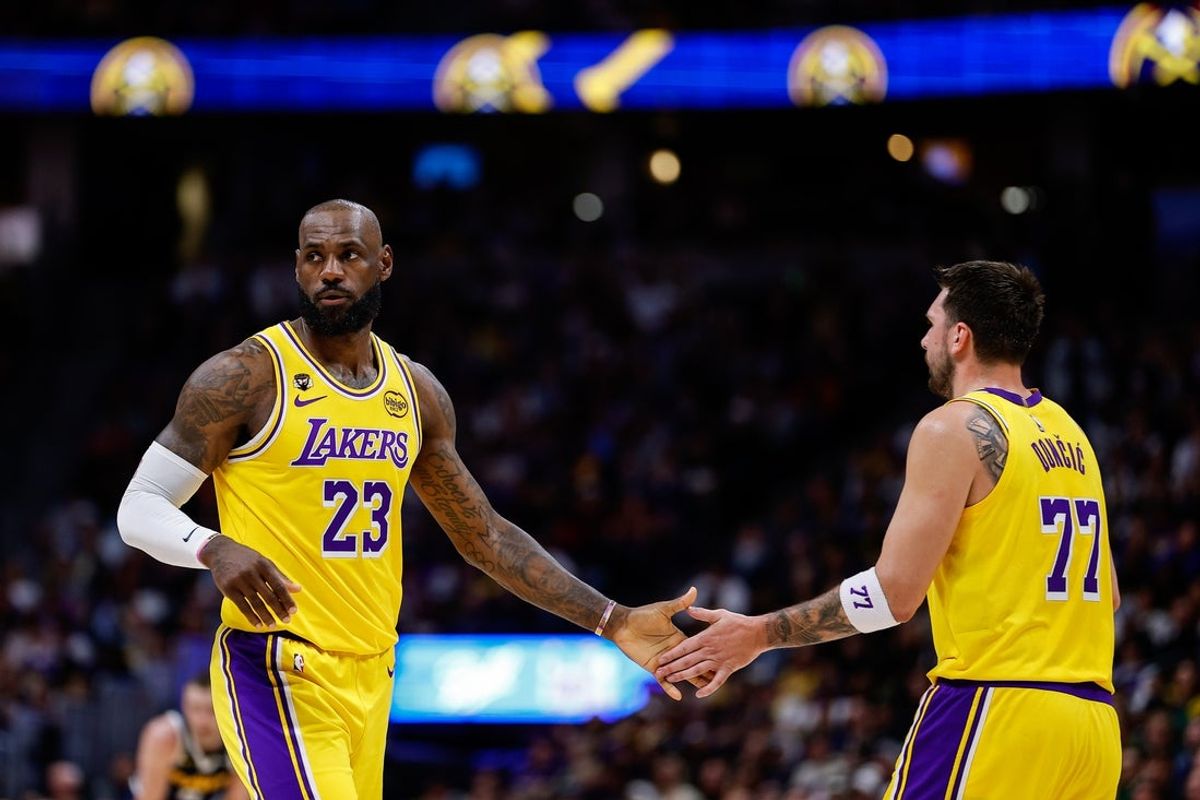 Mar 5, 2026; Denver, Colorado, USA; Los Angeles Lakers forward LeBron James (23) and guard Luka Doncic (77) in the first quarter against the Denver Nuggets at Ball Arena. Mandatory Credit: Isaiah J. Downing-Imagn Images
