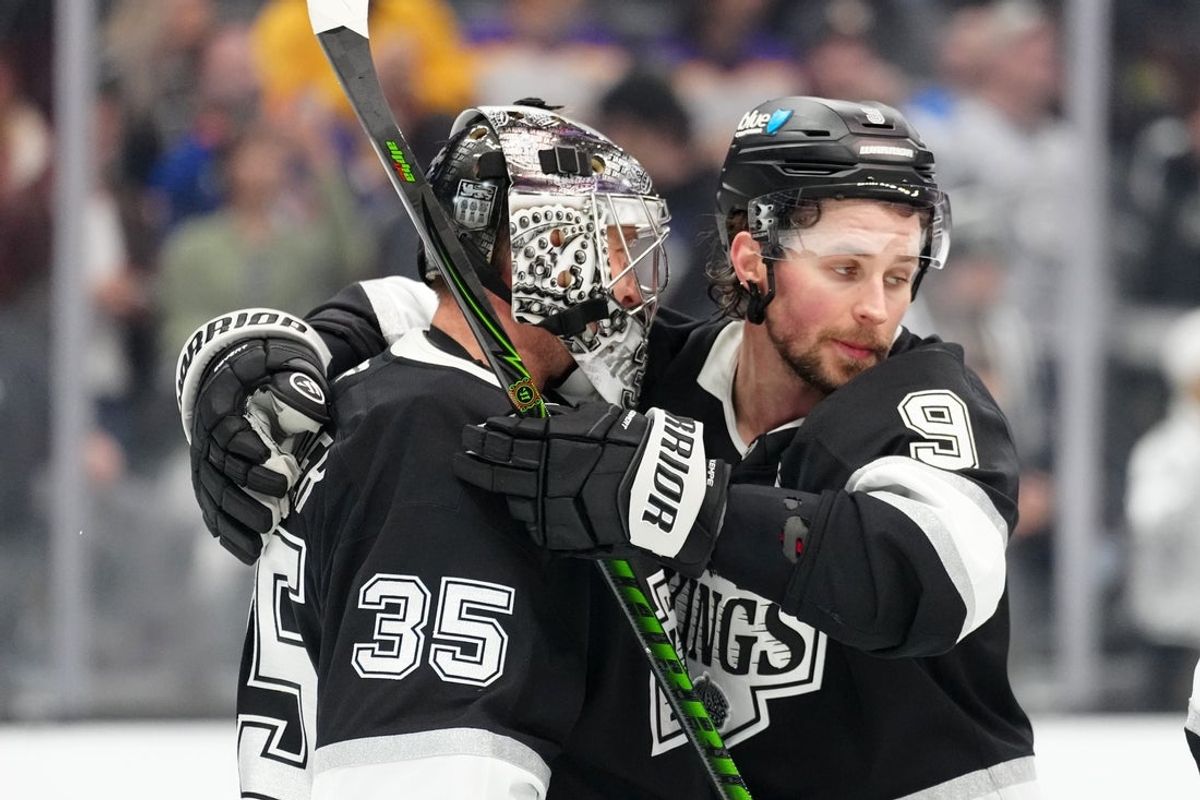 Mar 5, 2026; Los Angeles, California, USA; LA Kings goaltender Darcy Kuemper (35) and right wing Adrian Kempe (9) embrace after the game against the New York Islanders at Crypto.com Arena. Mandatory Credit: Kirby Lee-Imagn Images