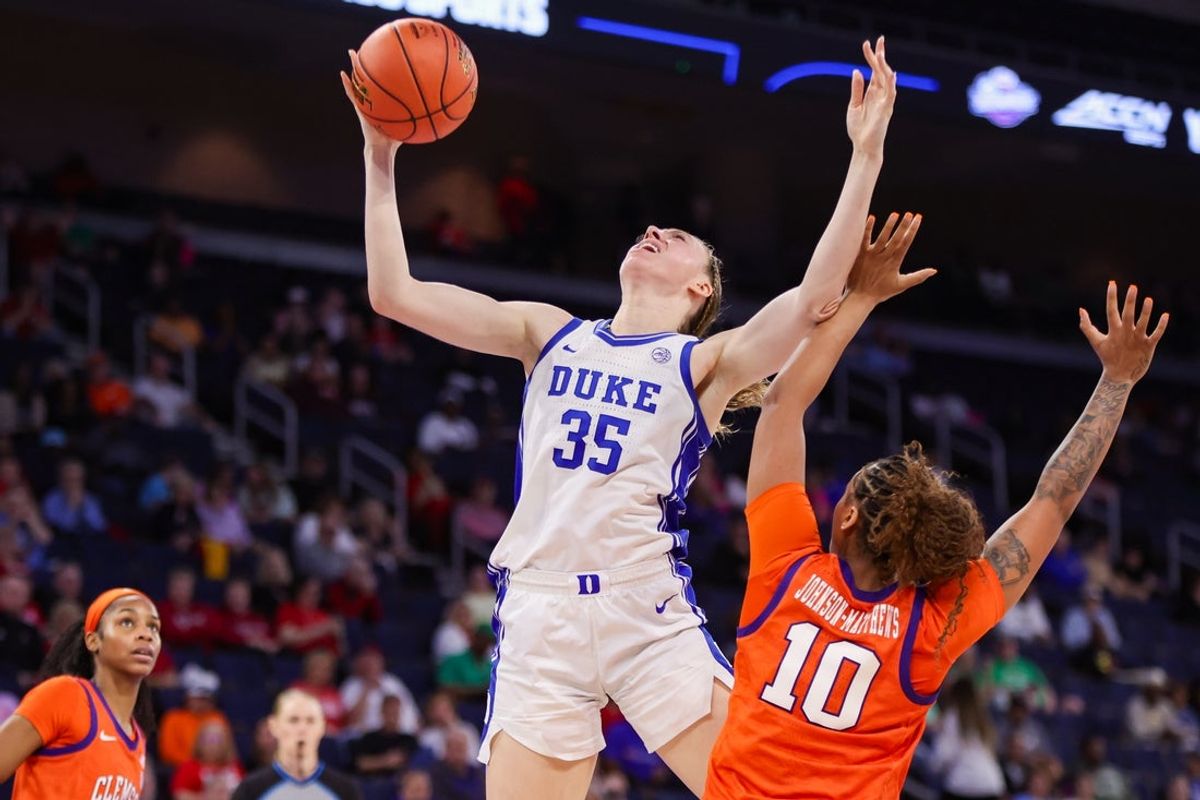 Mar 6, 2026; Duluth, GA, USA; Duke Blue Devils forward Toby Fournier (35) shoots over Clemson Tigers guard Taylor Johnson-Matthews (10) in the third quarter at Gas South Arena. Mandatory Credit: Brett Davis-Imagn Images