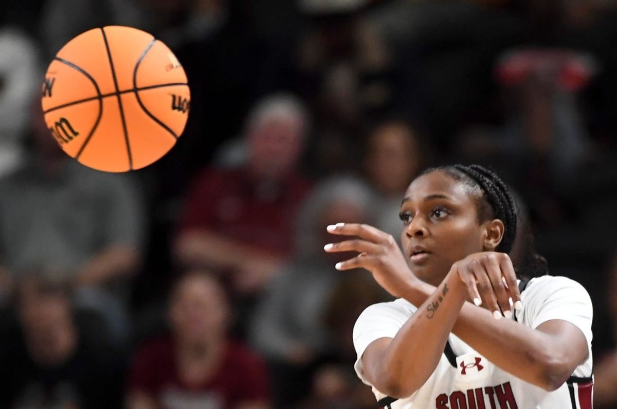 South Carolina Gamecocks guard Ta'niya Latson (00) passes the ball Friday, March 6, 2026, during the SEC Women's Basketball Tournament quarterfinals game against the Kentucky Wildcats at Bon Secours Wellness Arena in Greenville, South Carolina.