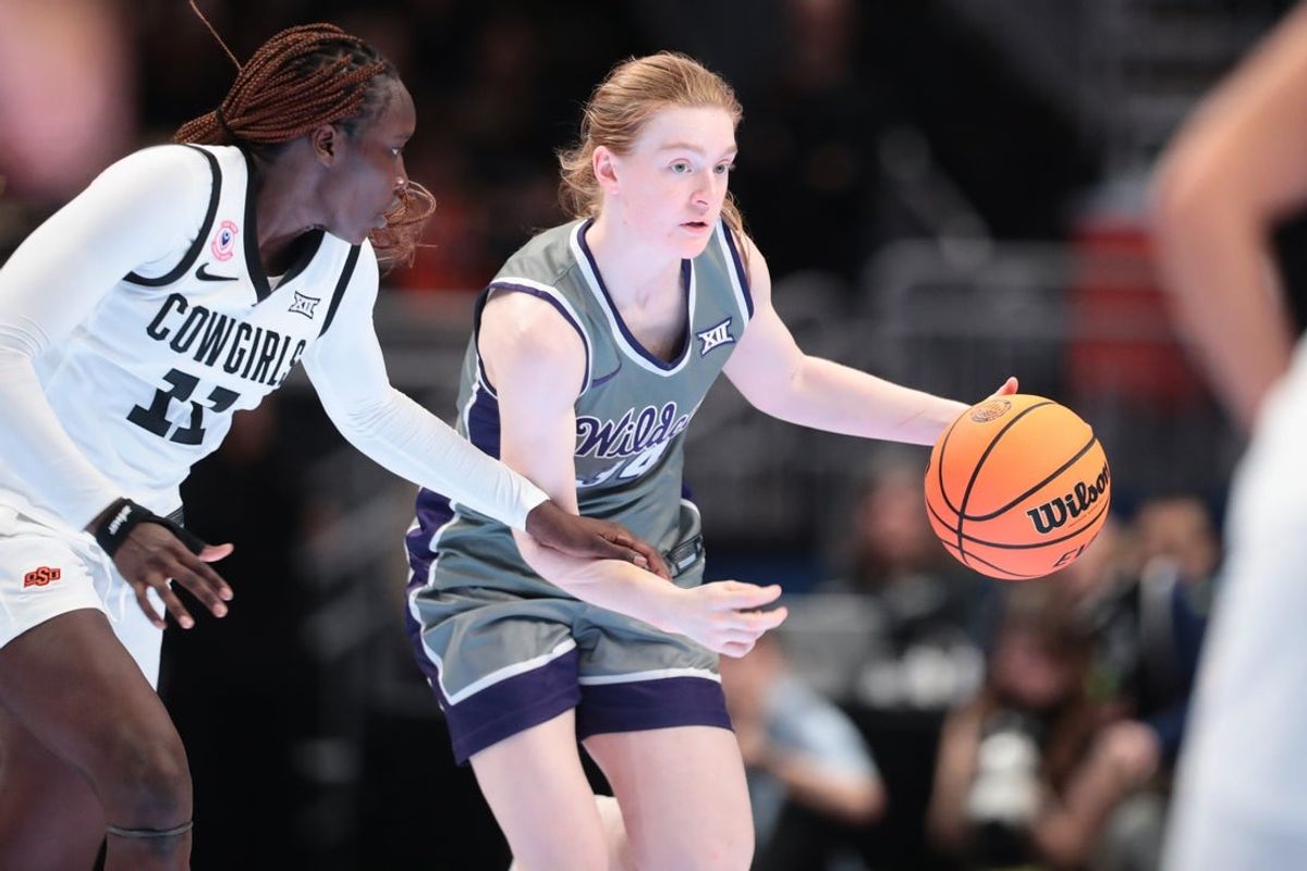 Kansas State Wildcats guard Tess Heal (34) defends the ball against Oklahoma State Cowgirls during the quarterfinal round of the Big 12 Tournament inside T-Mobile Center in Kansas City, Missouri, on Friday, March 6, 2026.