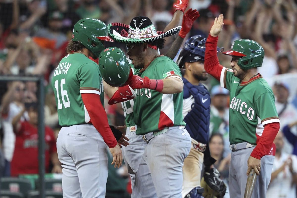 Mar 6, 2026; Houston, TX, United States; Mexico first baseman Jonathan Aranda (8) celebrates with right fielder Jarren Duran (16) after. hitting a home run during the eighth inning against Great Britain at Daikin Park. Mandatory Credit: Troy Taormina-Imagn Images