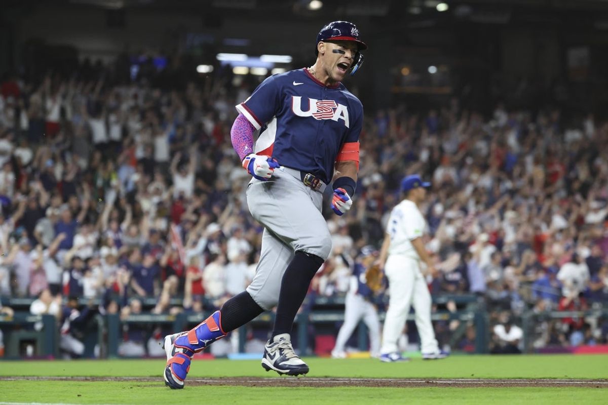 Mar 6, 2026; Houston, TX, United States; United States right fielder Aaron Judge (99) reacts after hitting a home run during the first inning against Brazil at Daikin Park. Mandatory Credit: Troy Taormina-Imagn Images