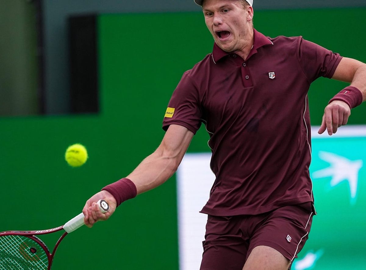 Jenson Brooksby swings at the ball during his second-round match at the BNP Paribas Open in Indian Wells, Calif., Friday, March 6, 2026.