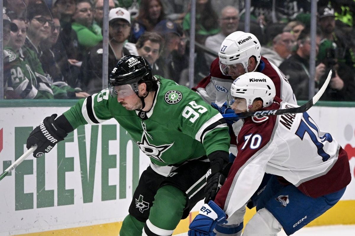 Mar 6, 2026; Dallas, Texas, USA; Colorado Avalanche defenseman Sam Malinski (70) is hit in the face by the stick of center Alex Barre-Boulet (27) as they chase the puck with Dallas Stars center Matt Duchene (95) during the second period at the American Airlines Center. Mandatory Credit: Jerome Miron-Imagn Images