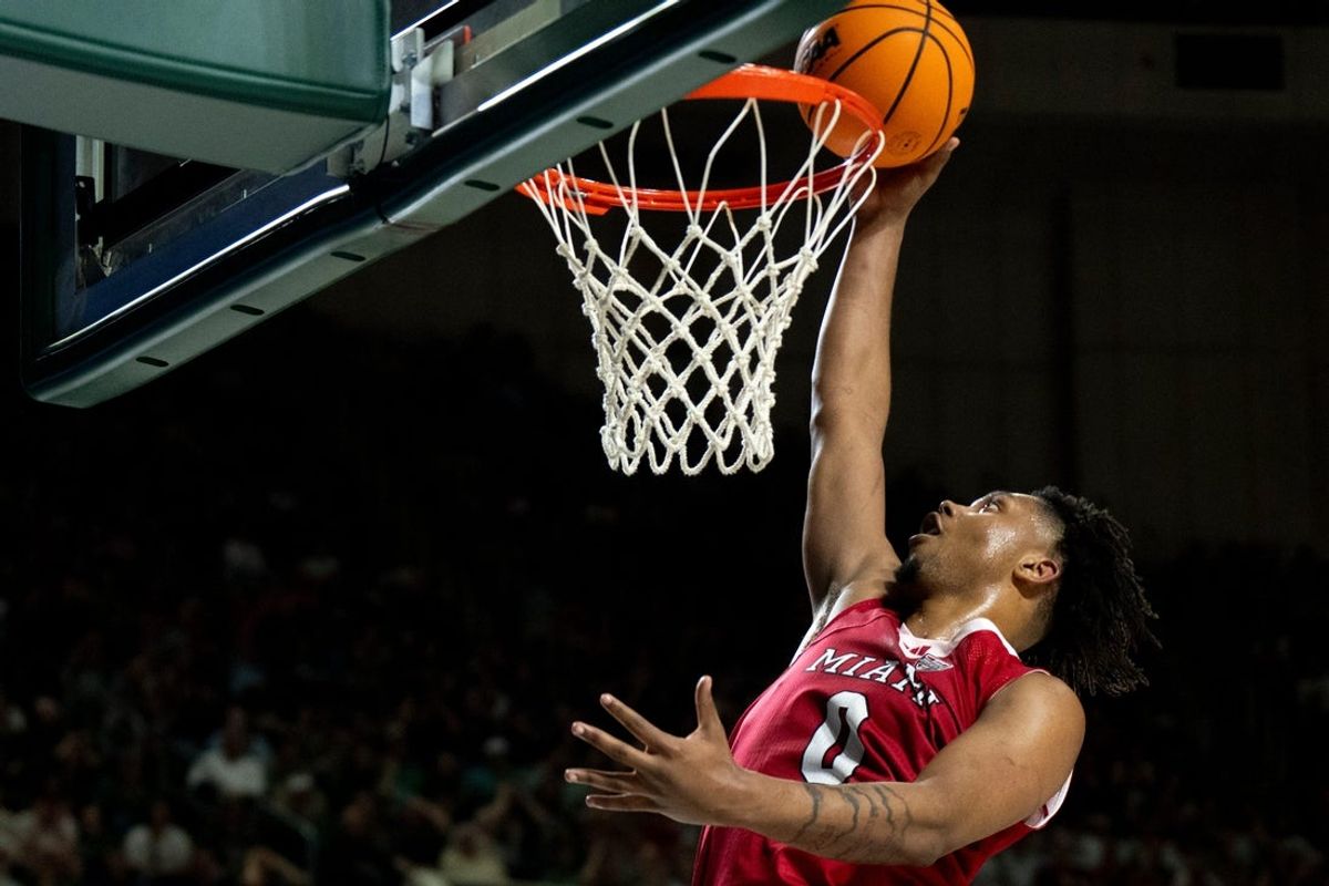 Miami RedHawks guard Eian Elmer (0) hits a layup in the second half of the MAC conference final game at the Convocation Center in Athens, Ohio, on Friday, March 6, 2026.