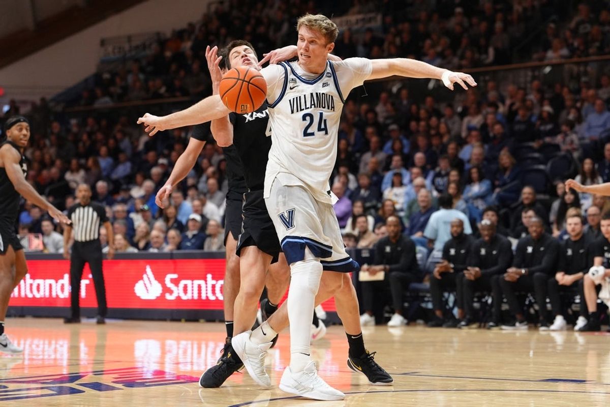 Mar 7, 2026; Villanova, Pennsylvania, USA; Villanova Wildcats forward Duke Brennan (24) and Xavier Musketeers forward Filip Borovicanin (4) battle for the ball in the first half at William B. Finneran Pavilion. Mandatory Credit: Kyle Ross-Imagn Images