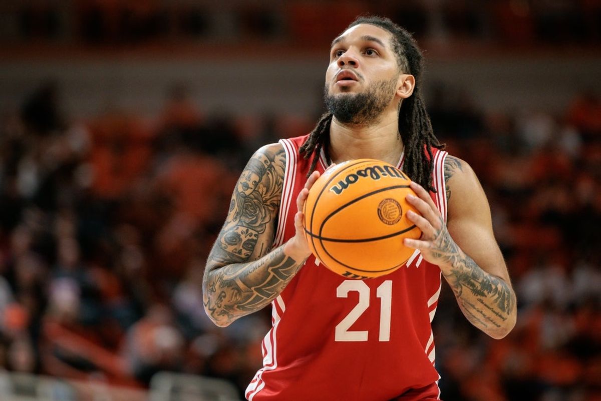 Mar 7, 2026; Stillwater, Oklahoma, USA; Houston Cougars guard Emanuel Sharp (21) shoots a free throw during the second half against the Oklahoma State Cowboys at Gallagher-Iba Arena. Mandatory Credit: William Purnell-Imagn Images