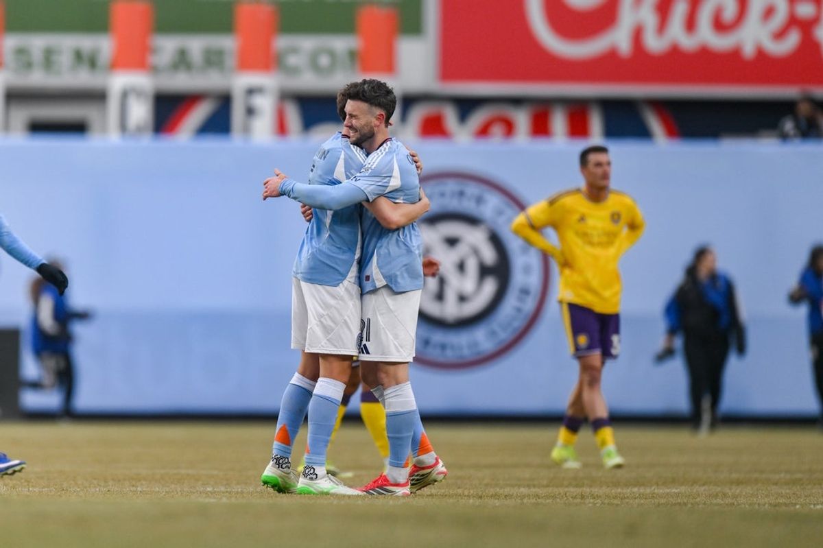Mar 7, 2026; New York, New York, USA; defender Kai Trewin (5) and New York City midfielder Aiden O'Neill (21) embrace after winning against Orlando City at Yankee Stadium. Mandatory Credit: John Jones-Imagn Images
