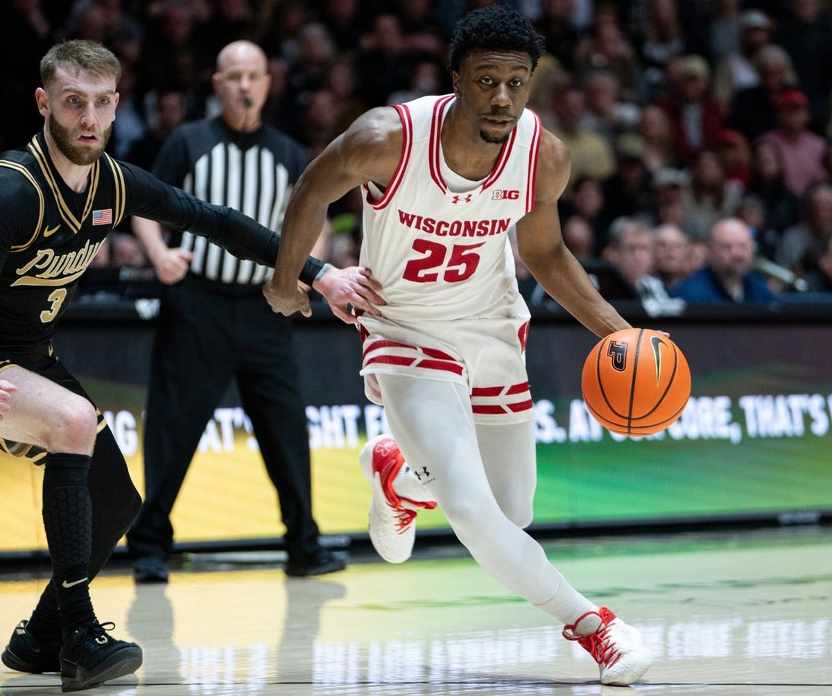 Mar 7, 2026; West Lafayette, Indiana, USA; Wisconsin Badgers guard John Blackwell (25) drives to the basket during the first half against the Purdue Boilermakers at Mackey Arena. Mandatory Credit: Jacob Musselman-Imagn Images
