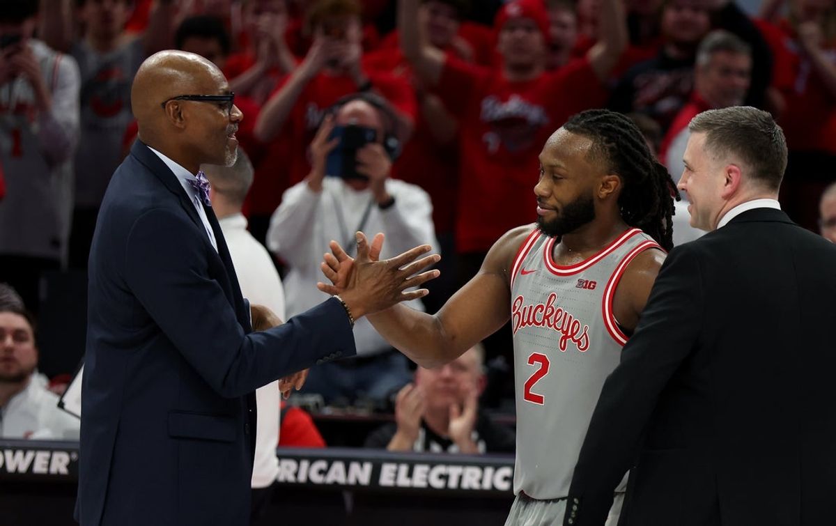 Mar 7, 2026; Columbus, Ohio, USA;  Ohio State Buckeyes guard Bruce Thornton (2) celebrates breaking the school all time scoring record with former recored holder Dennis Hopson and Ohio State Buckeyes head coach Jake Diebler (right) during the first half at Value City Arena. Mandatory Credit: Joseph Maiorana-Imagn Images