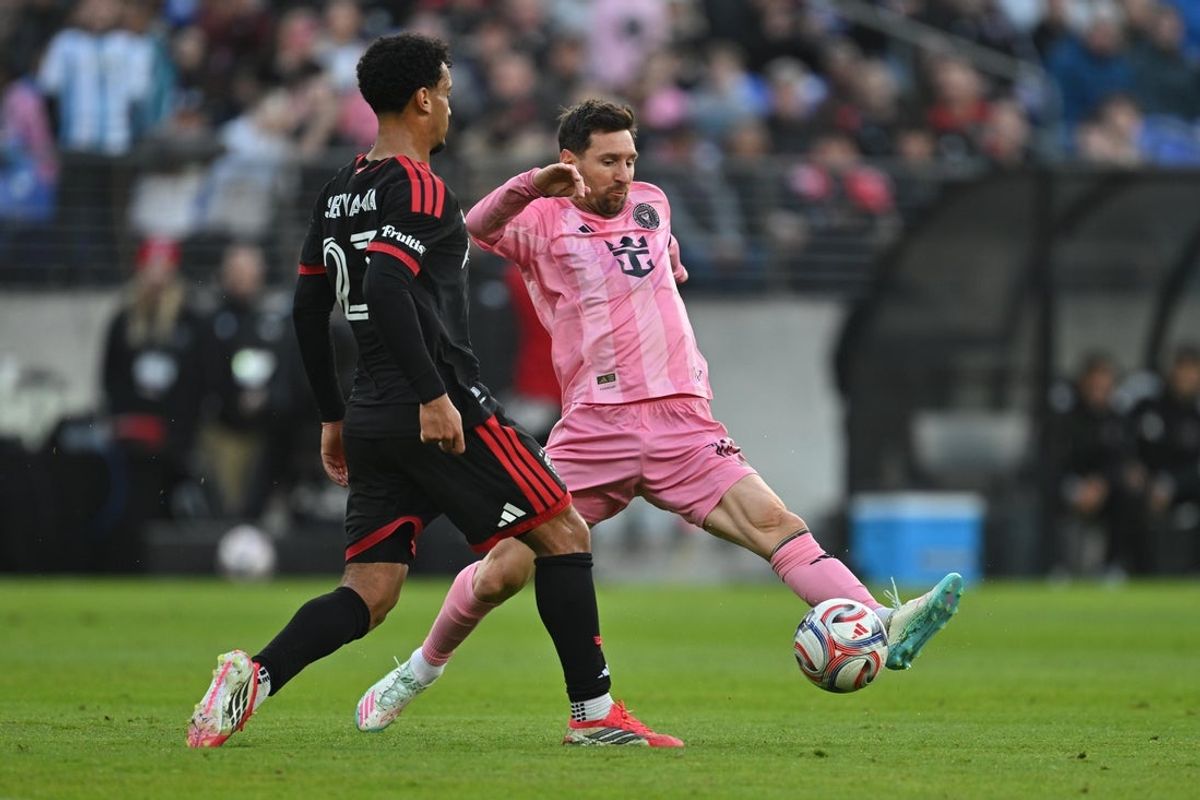 Mar 7, 2026; Baltimore, Maryland, USA;  Inter Miami CF forward Lionel Messi (10) blocks a pass by DC United midfielder Brandon Servania (23) in the first half at M&T Bank Stadium. Mandatory Credit: Jamie Sabau-Imagn Images