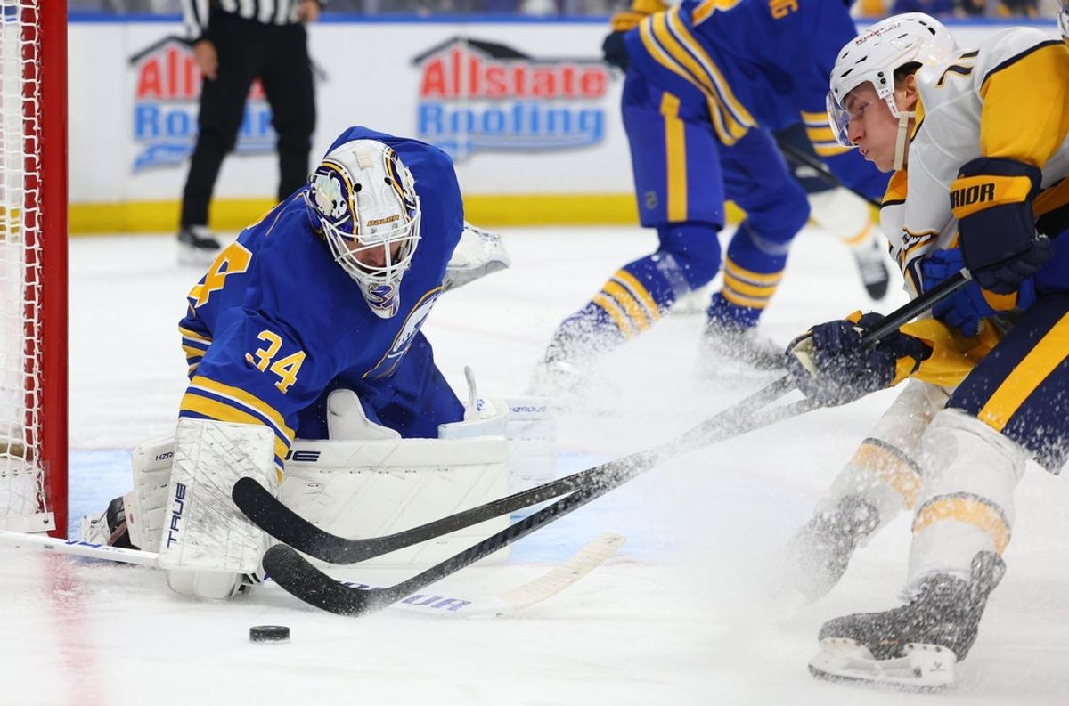 Mar 7, 2026; Buffalo, New York, USA;  Buffalo Sabres goaltender Alex Lyon (34) makes a save during the third period against the Nashville Predators at KeyBank Center. Mandatory Credit: Timothy T. Ludwig-Imagn Images