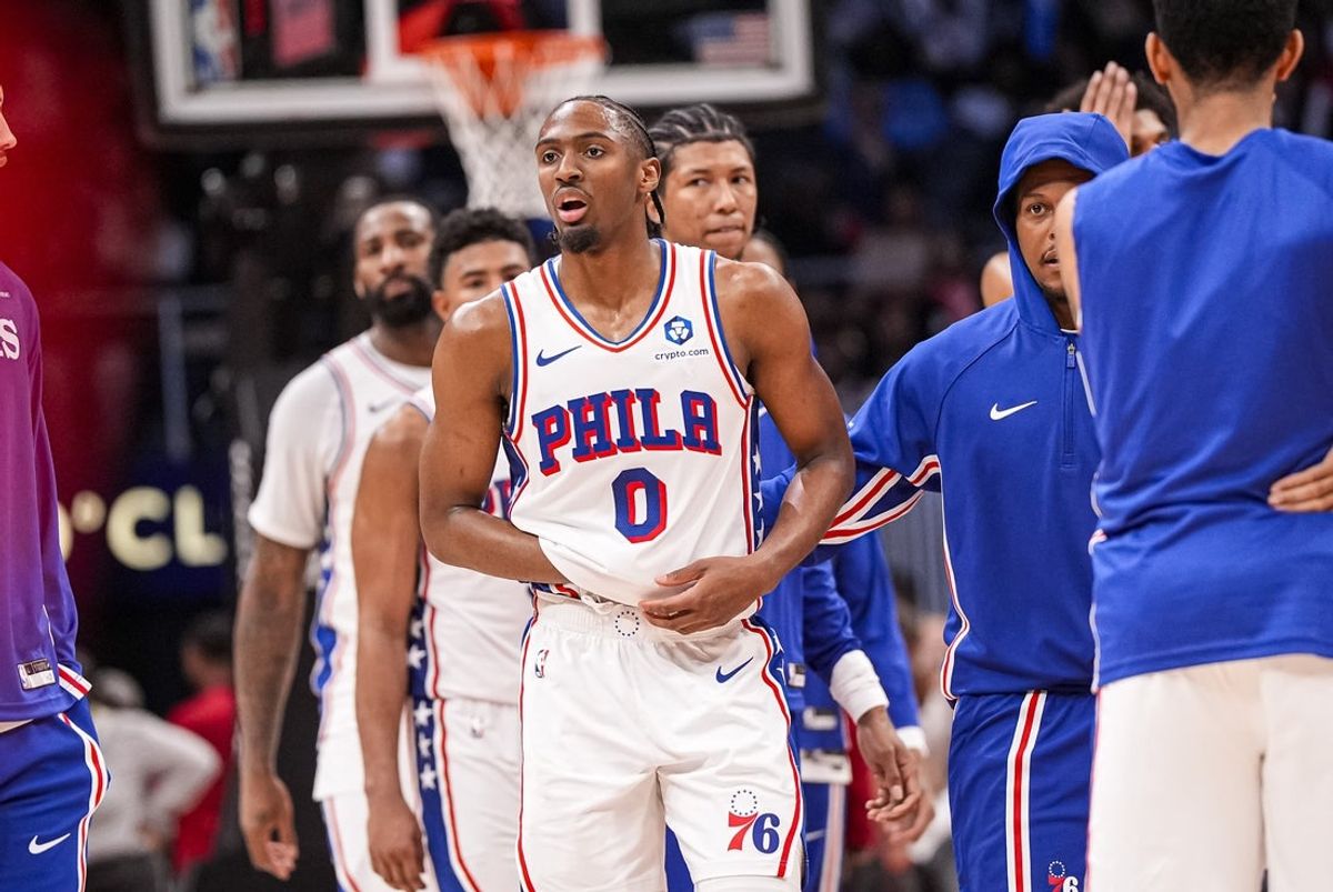 Mar 7, 2026; Atlanta, Georgia, USA; Philadelphia 76ers guard Tyrese Maxey (0) reacts and is assisted after being injured against the Atlanta Hawks during the second half at State Farm Arena. Mandatory Credit: Dale Zanine-Imagn Images