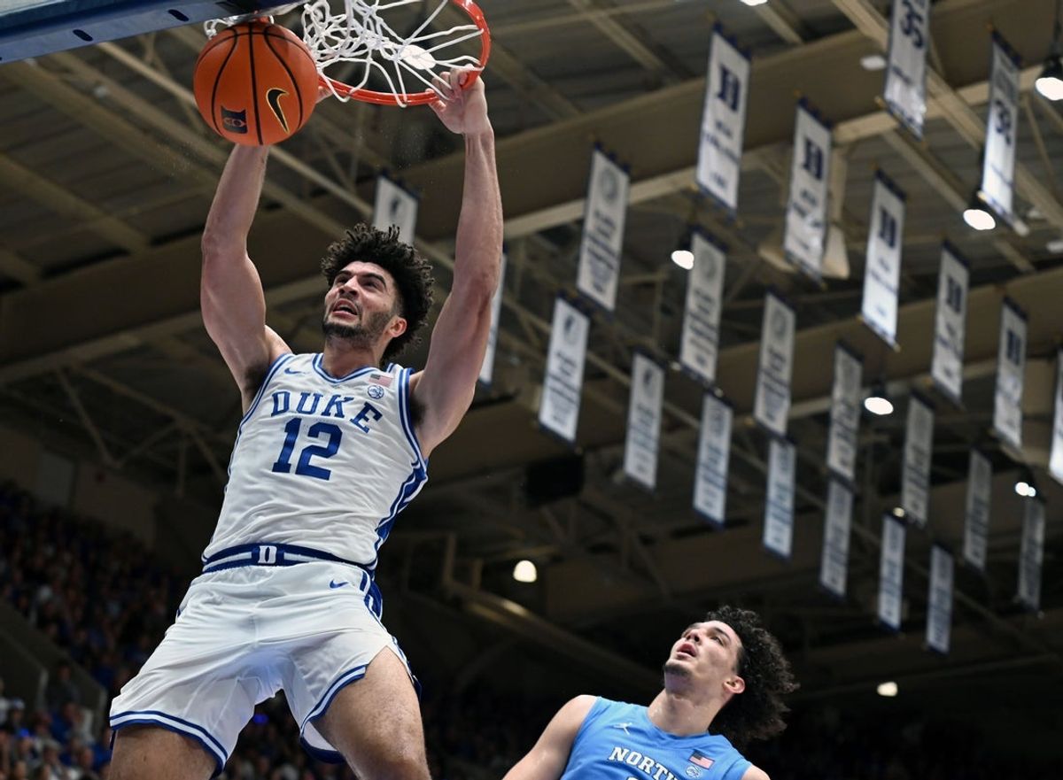 Mar 7, 2026; Durham, North Carolina, USA; Duke Blue Devils forward Cameron Boozer (12) dunks during the second half against the North Carolina Tar Heels at Cameron Indoor Stadium.  The Duke Blue Devils won 76-61. Mandatory Credit: Rob Kinnan-Imagn Images