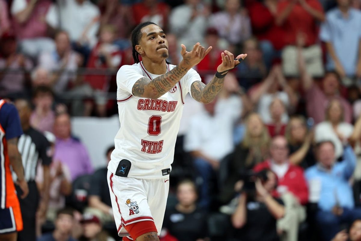 Mar 7, 2026; Tuscaloosa, Alabama, USA; Alabama Crimson Tide guard Labaron Philon (0) reacts after his three pointer during the first half against the Auburn Tigers at Coleman Coliseum. Mandatory Credit: David Leong-Imagn Images