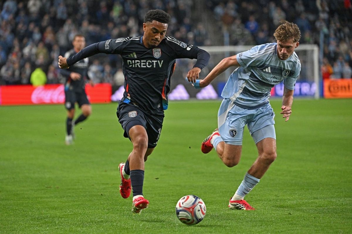 Mar 7, 2026; Kansas City, Kansas, USA;  San Diego FC midfielder Pedro Soma (15) dribbles the ball against Sporting Kansas City in the first half at Sporting Park. Mandatory Credit: Peter Aiken-Imagn Images