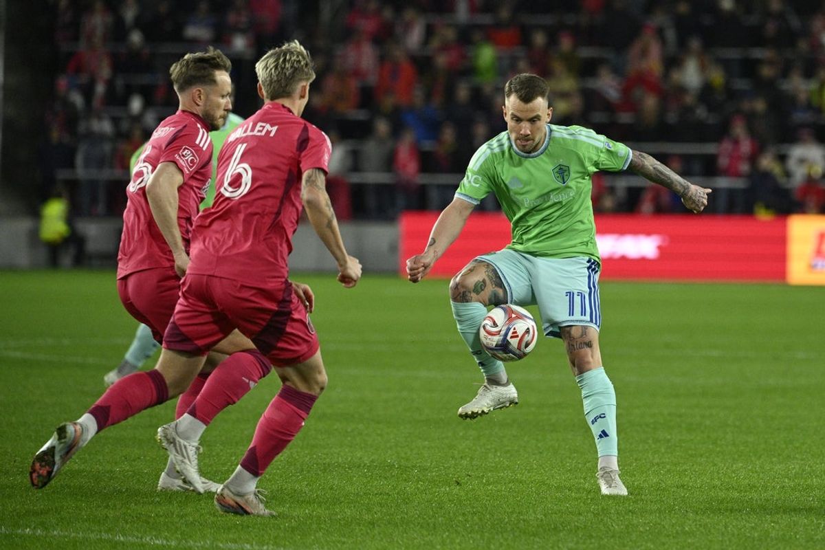Mar 7, 2026; St. Louis, Missouri, USA; St. Louis City SC midfielder Conrad Wallem (6) pressures Seattle Sounders FC midfielder Albert Rusnak (11) in the first half at Energizer Park. Mandatory Credit: Joe Puetz-Imagn Images