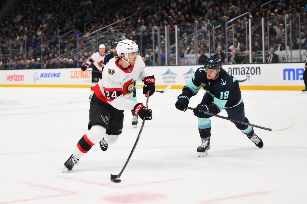 Mar 7, 2026; Seattle, Washington, USA; Ottawa Senators center Dylan Cozens (24) shoots and scores a goal against the Seattle Kraken during the first period at Climate Pledge Arena. Mandatory Credit: Steven Bisig-Imagn Images