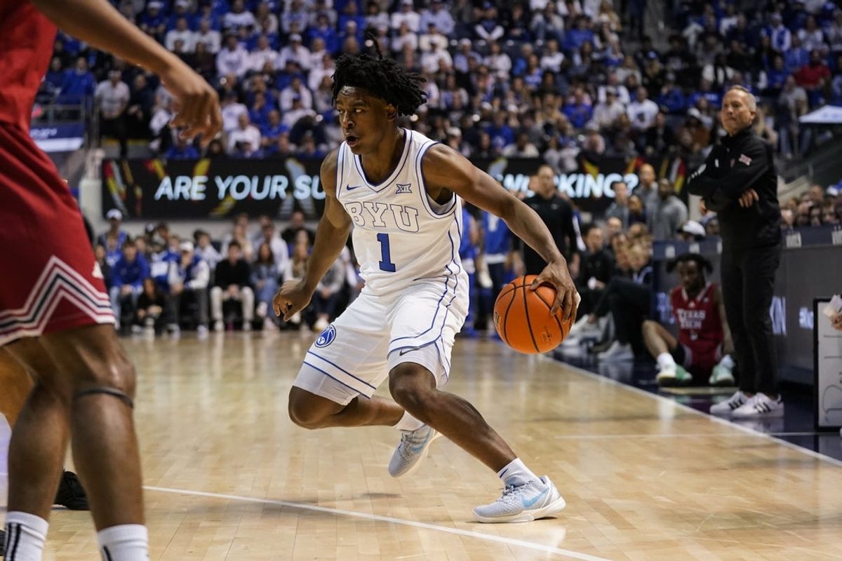 Mar 7, 2026; Provo, Utah, USA; BYU Cougars guard Robert Wright III (1) controls the ball during the first half against the Texas Tech Red Raiders at Marriott Center. Mandatory Credit: Aaron Baker-Imagn Images