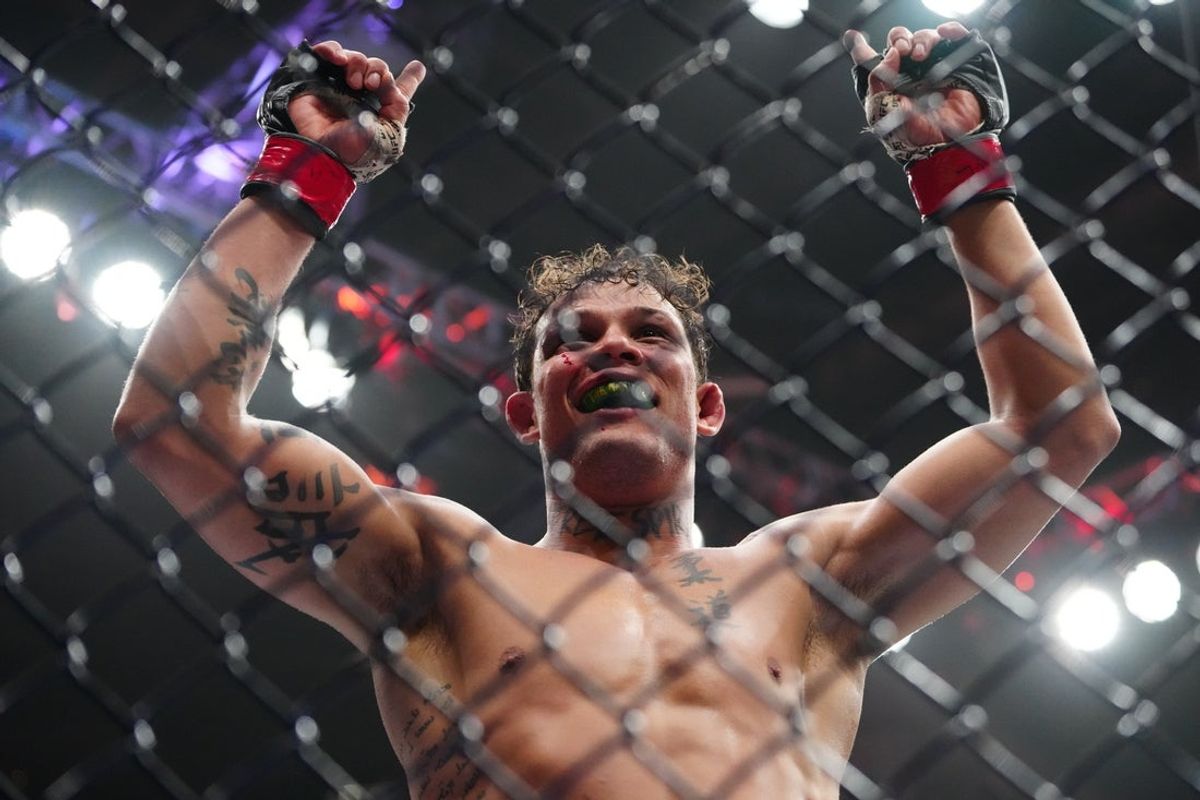 Mar 7, 2026; Las Vegas, Nevada, UNITED STATES; Caio Borralho (red gloves) reacts after defeating Reinier De Ridder (blue gloves) during UFC 326 at T-Mobile Arena. Mandatory Credit: Stephen R. Sylvanie-Imagn Images
