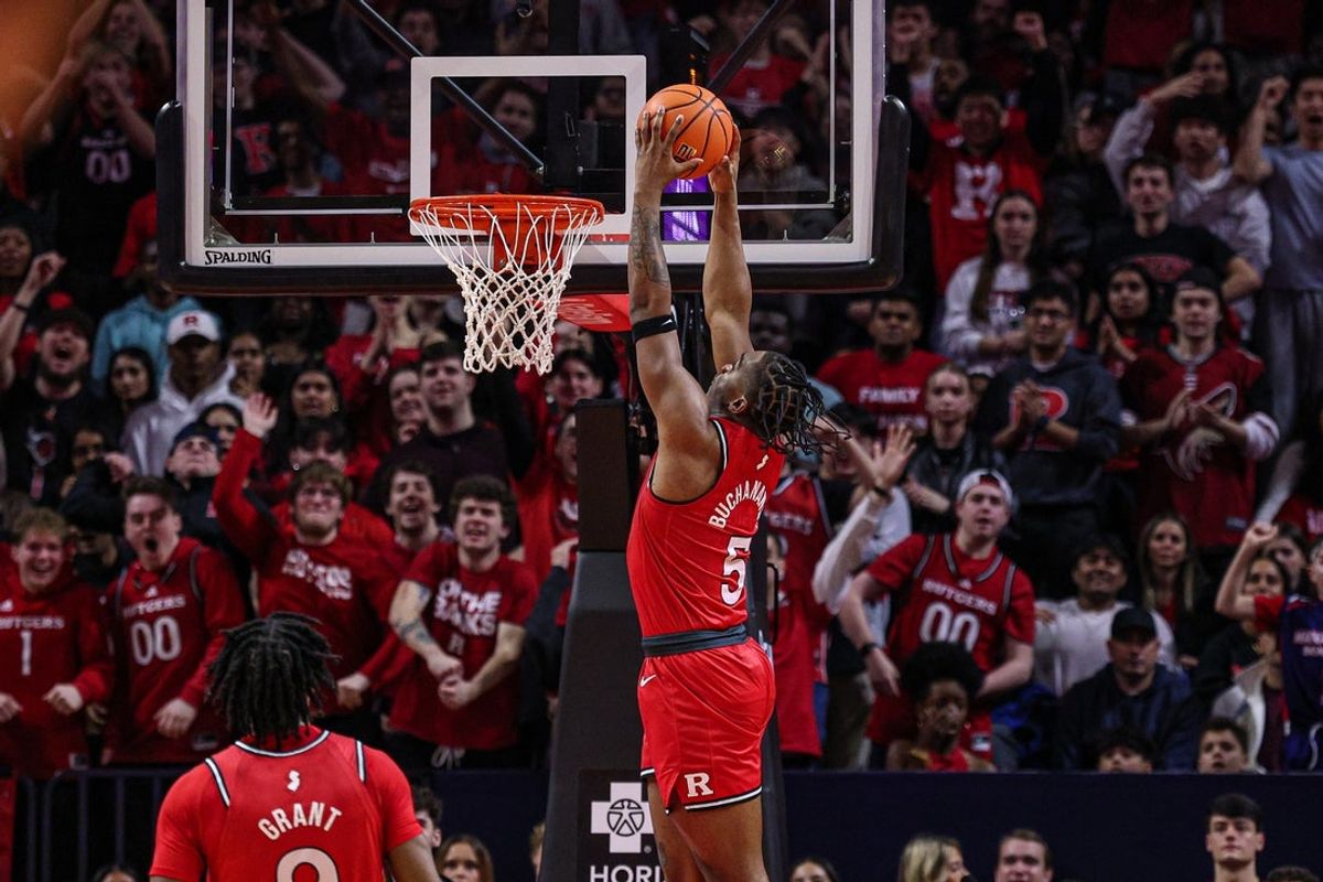 Mar 8, 2026; Piscataway, New Jersey, USA; Rutgers Scarlet Knights guard Darren Buchanan Jr. (5) goes up for a dunk during the first half against the Penn State Nittany Lions at Jersey Mike's Arena. Mandatory Credit: Vincent Carchietta-Imagn Images