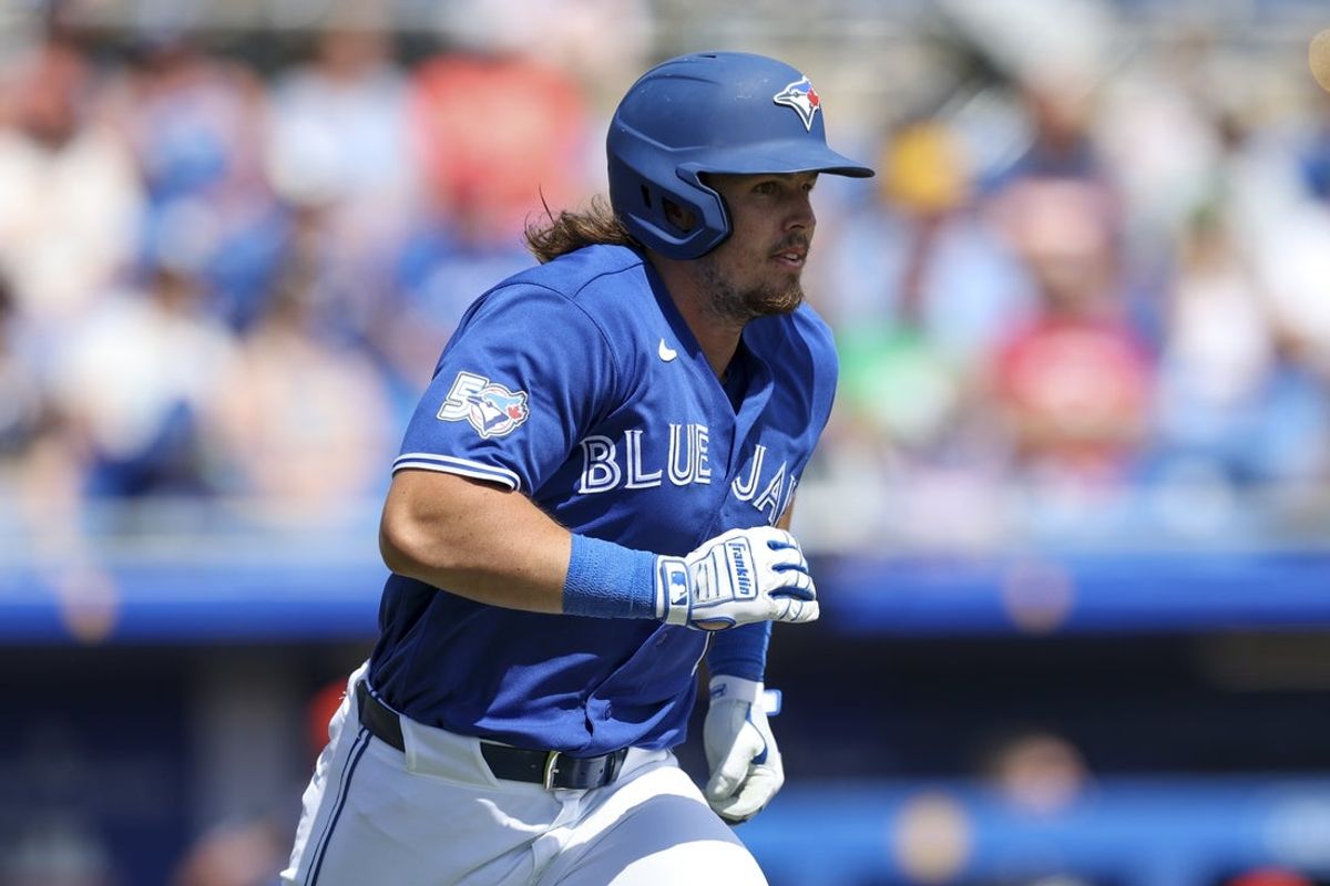 Mar 8, 2026; Dunedin, Florida, USA; Toronto Blue Jays third baseman Addison Barger (47) hits a two-rbi single against the Detroit Tigers in the third inning during spring training at TD Ballpark. Mandatory Credit: Nathan Ray Seebeck-Imagn Images