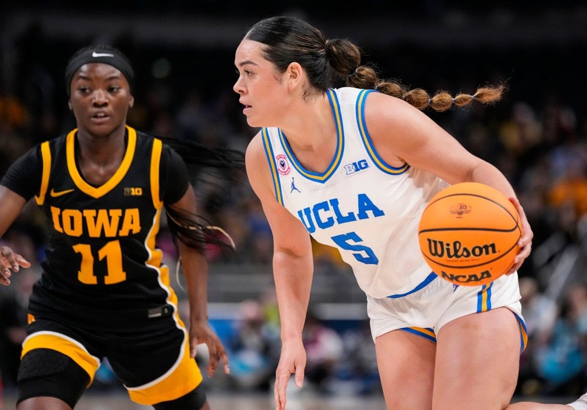 UCLA Bruins guard Charlisse Leger-Walker (5) rushes up the court Sunday, March 8, 2026, during the Big Ten Tournament Championship game at Gainbridge Fieldhouse in Indianapolis.
