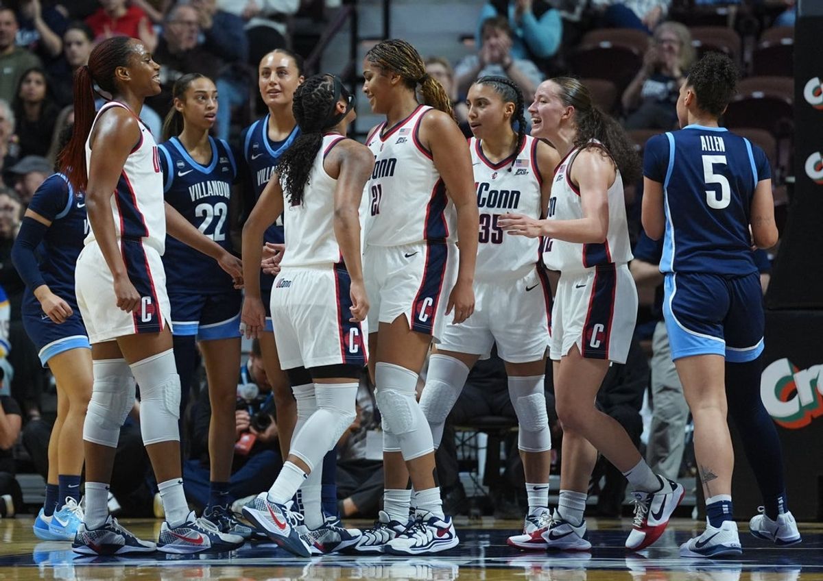 Mar 9, 2026; Uncasville, CT, USA; UConn Huskies forward Sarah Strong (21), guard Kk Arnold (2), guard Blanca Quinonez (4), guard Azzi Fudd (35) and guard Ashlynn Shade (12) react after a basket and one against the Villanova Wildcats in the first half at Mohegan Sun Arena. Mandatory Credit: David Butler II-Imagn Images