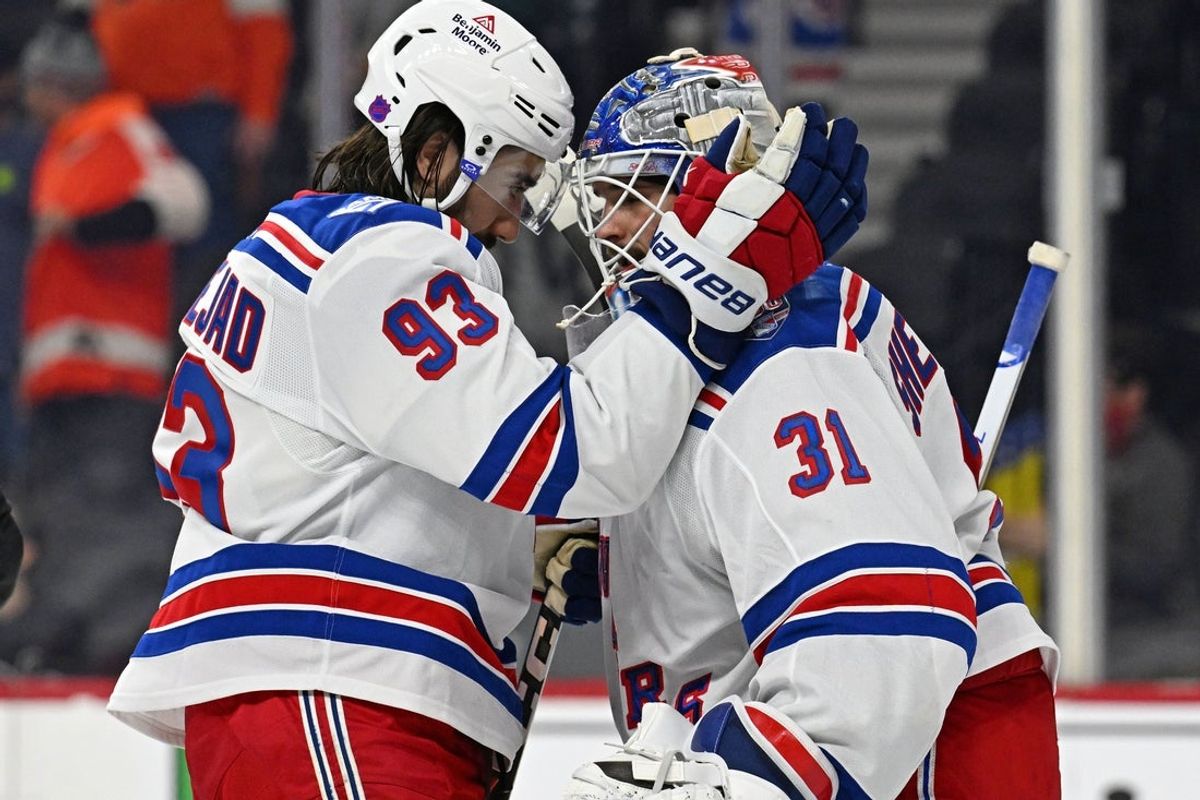 Mar 9, 2026; Philadelphia, Pennsylvania, USA; New York Rangers center Mika Zibanejad (93) and goaltender Igor Shesterkin (31) celebrate win against the Philadelphia Flyers at Xfinity Mobile Arena. Mandatory Credit: Eric Hartline-Imagn Images